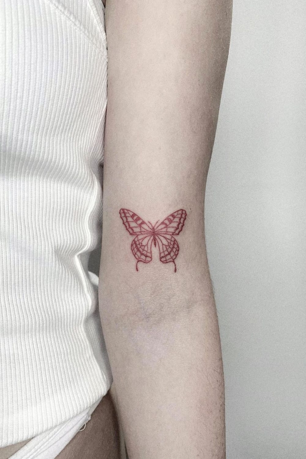 Simple Red Butterfly Tattoo