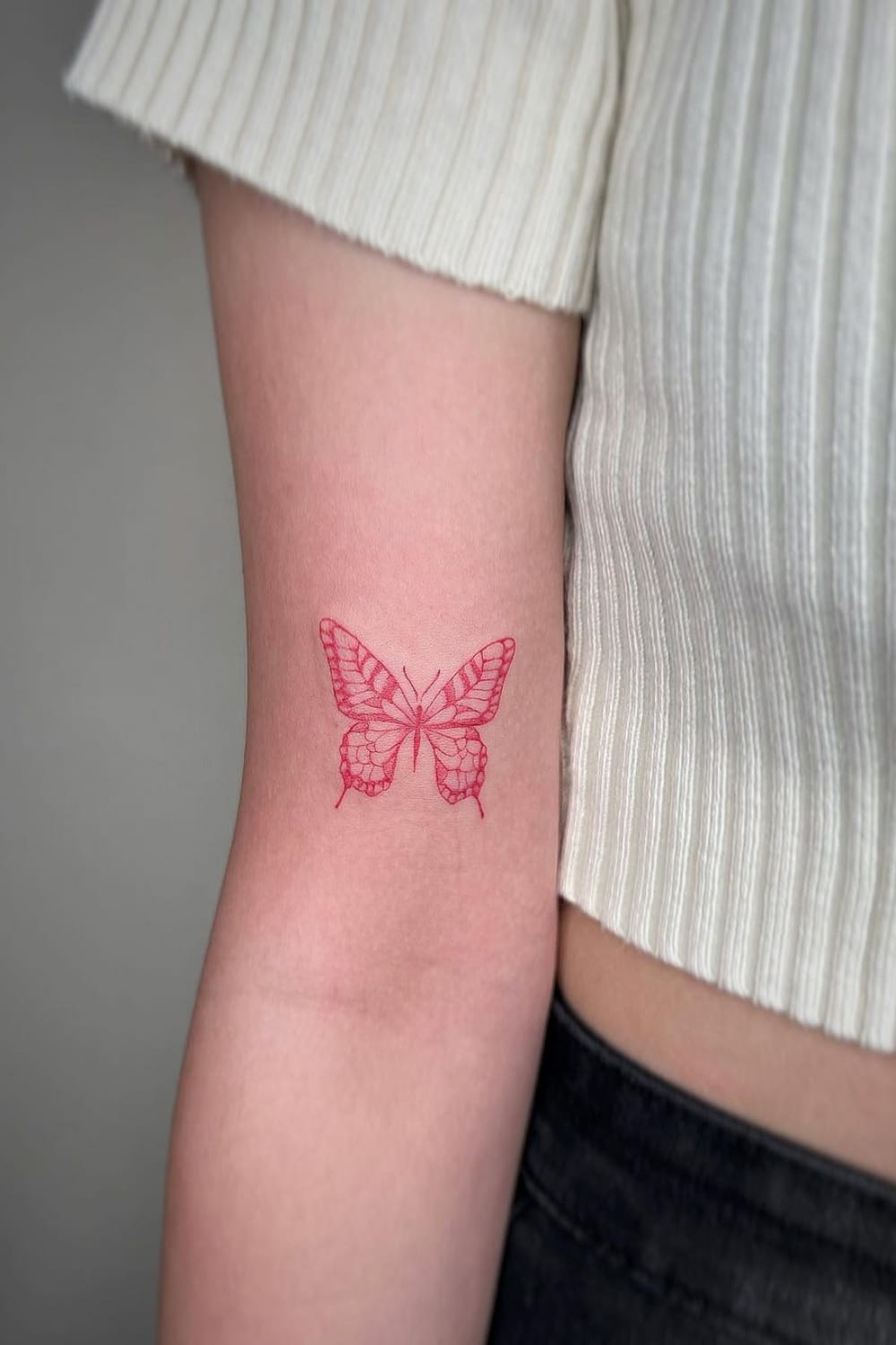 Small Red Butterfly Tattoo