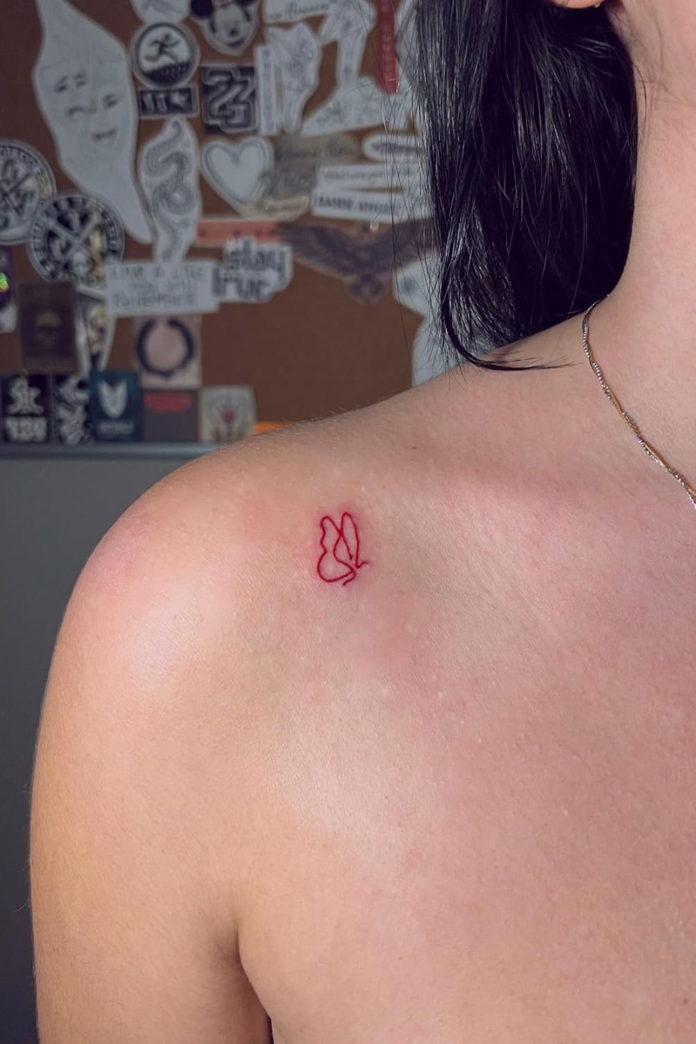 Tiny Red Butterfly Tattoo