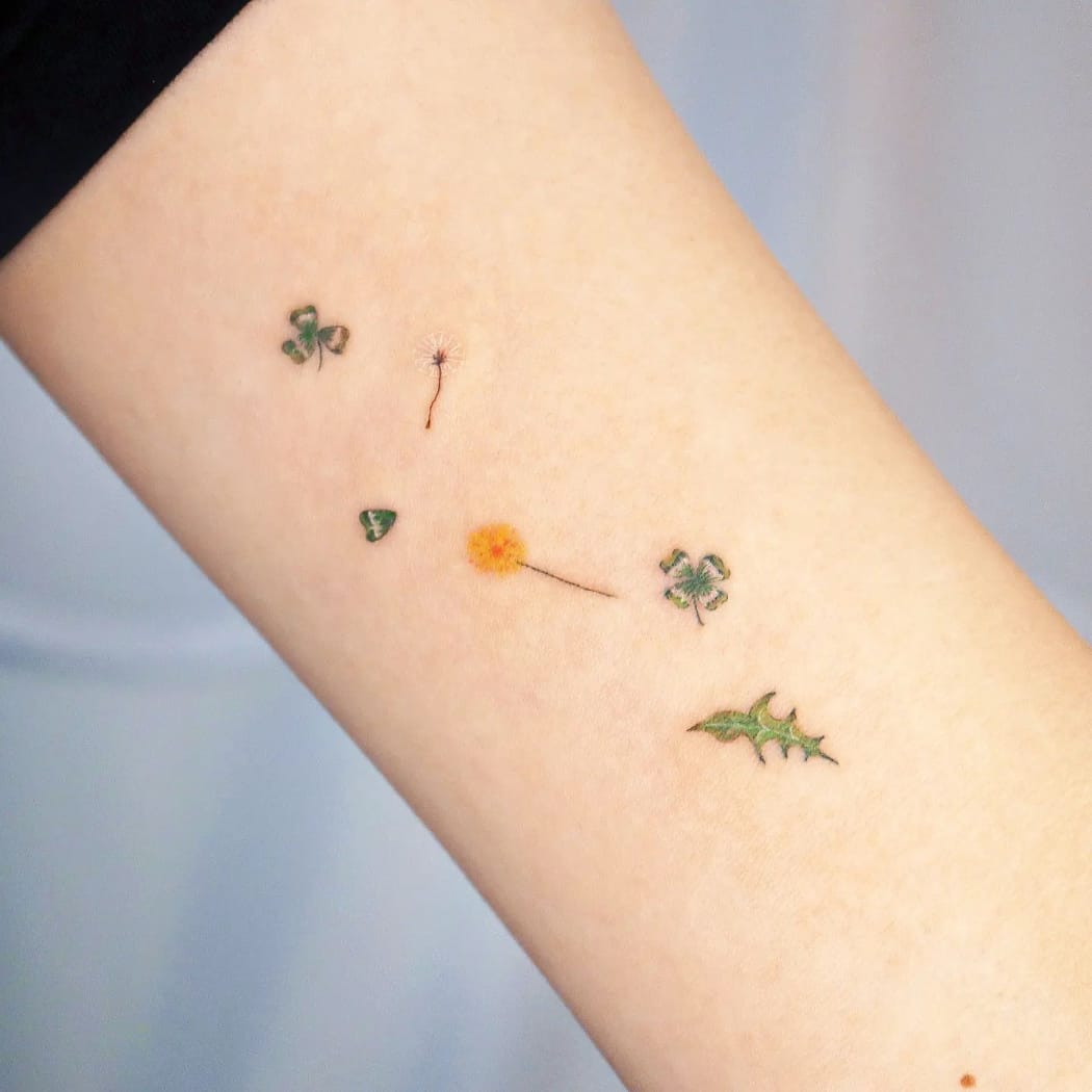 Four Leaf Clover and Dandelion Tattoo