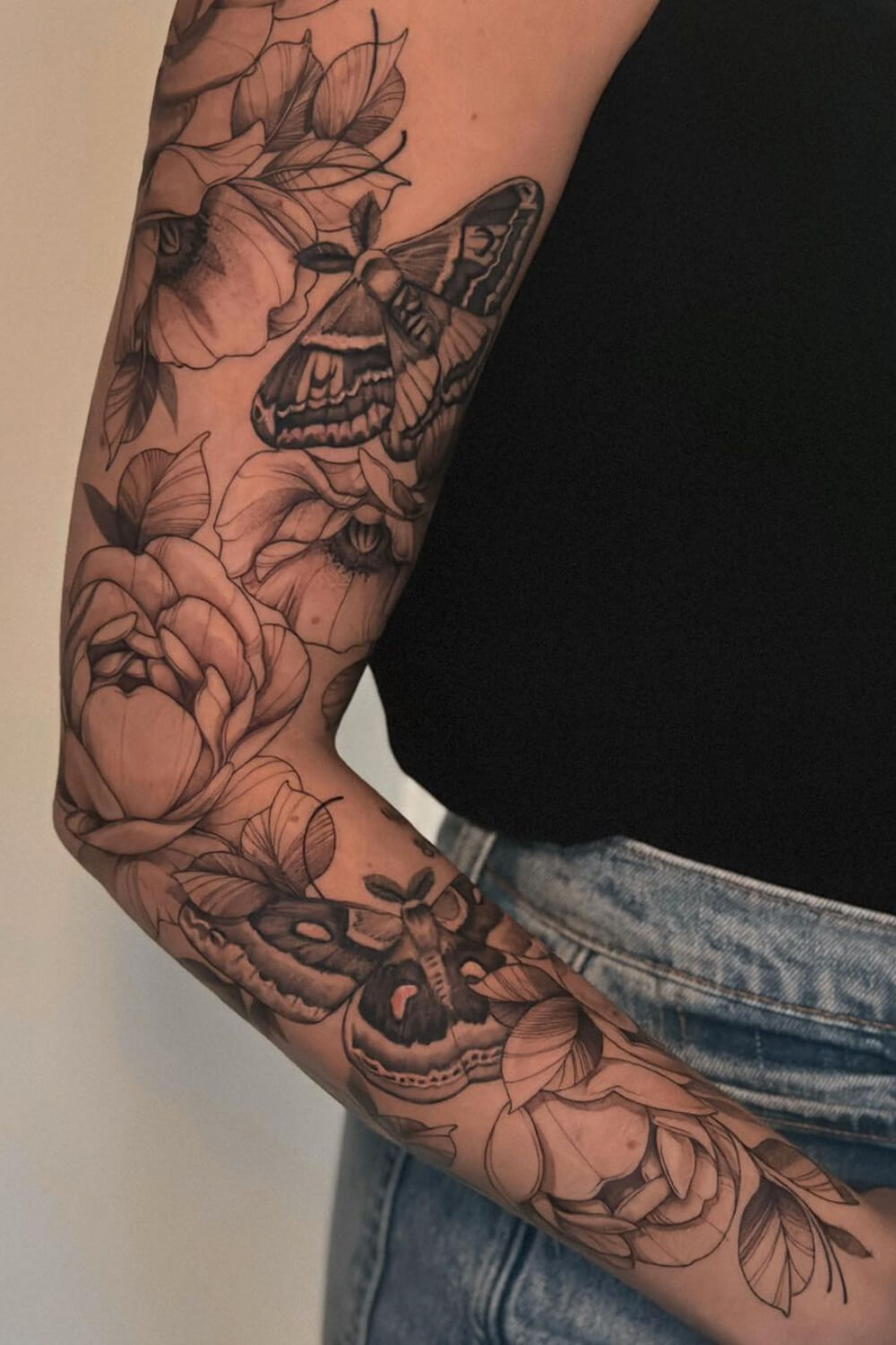 Flower and Moth Sleeve Tattoo