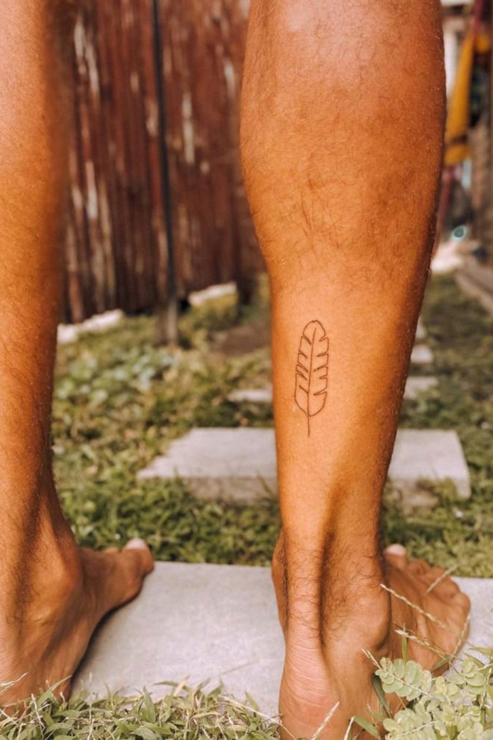 Geometric Feather Tattoo