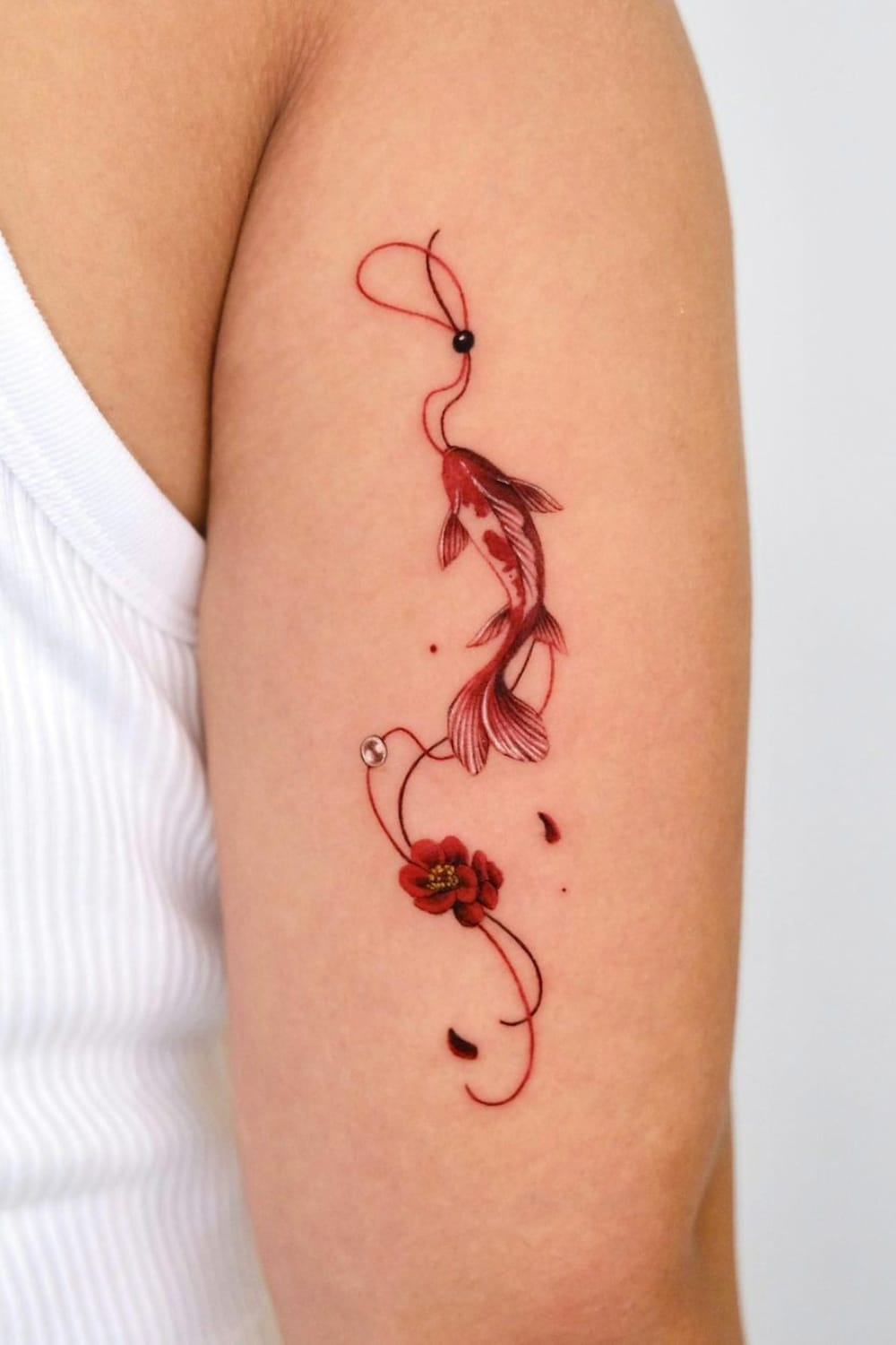 Koi Fish Amulet Tattoo