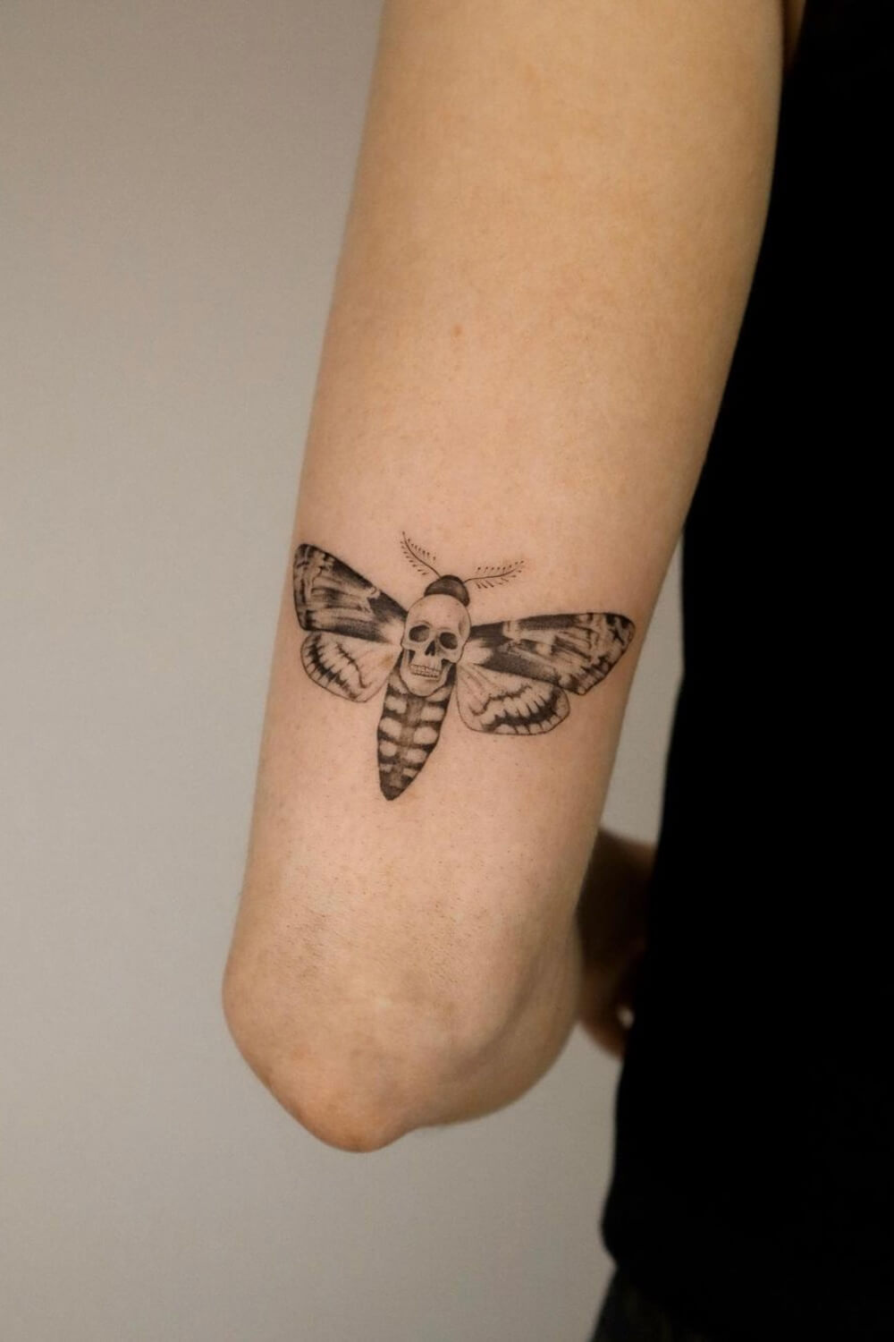 Simple Death Moth Tattoo