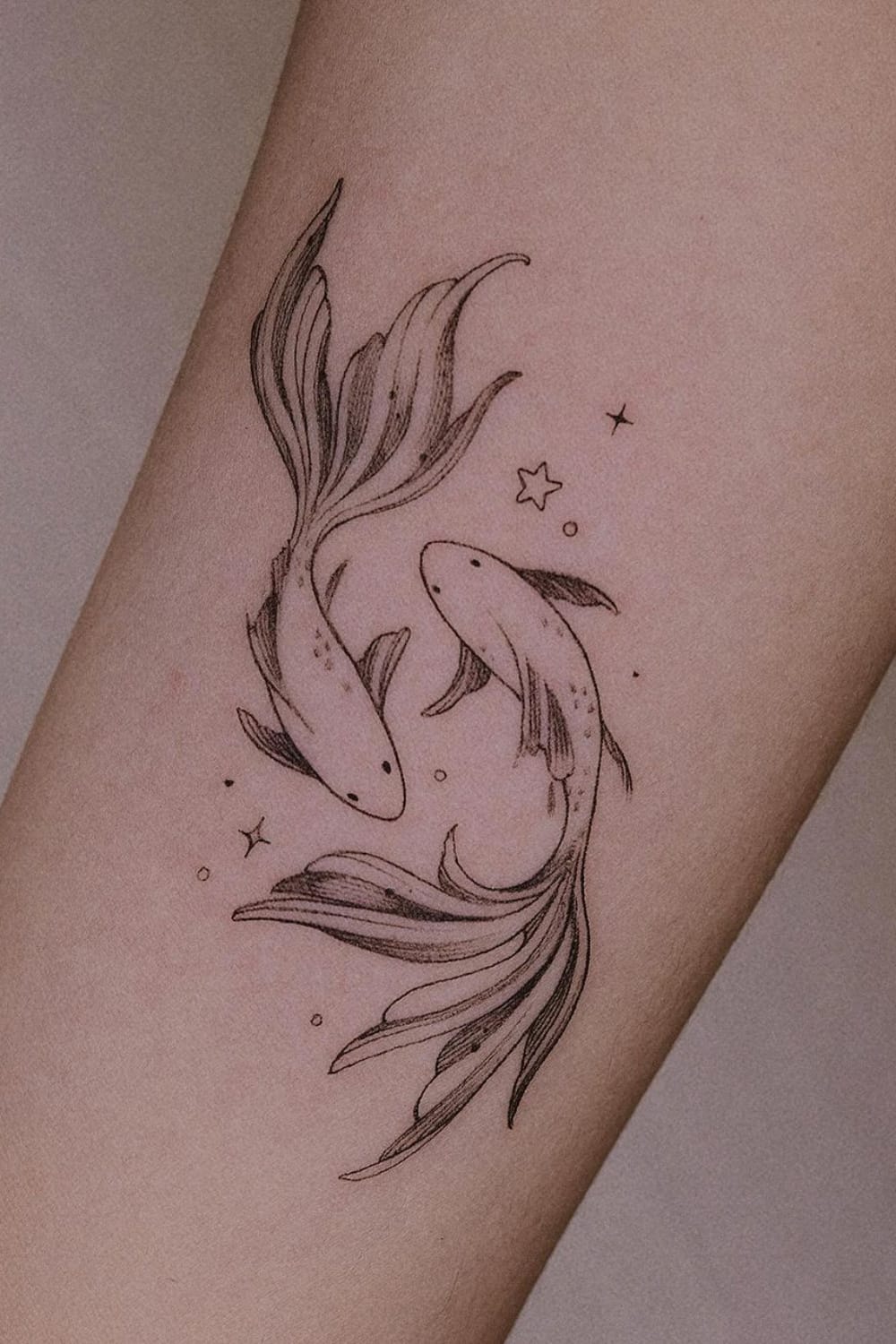 Star and Koi Fish Tattoo