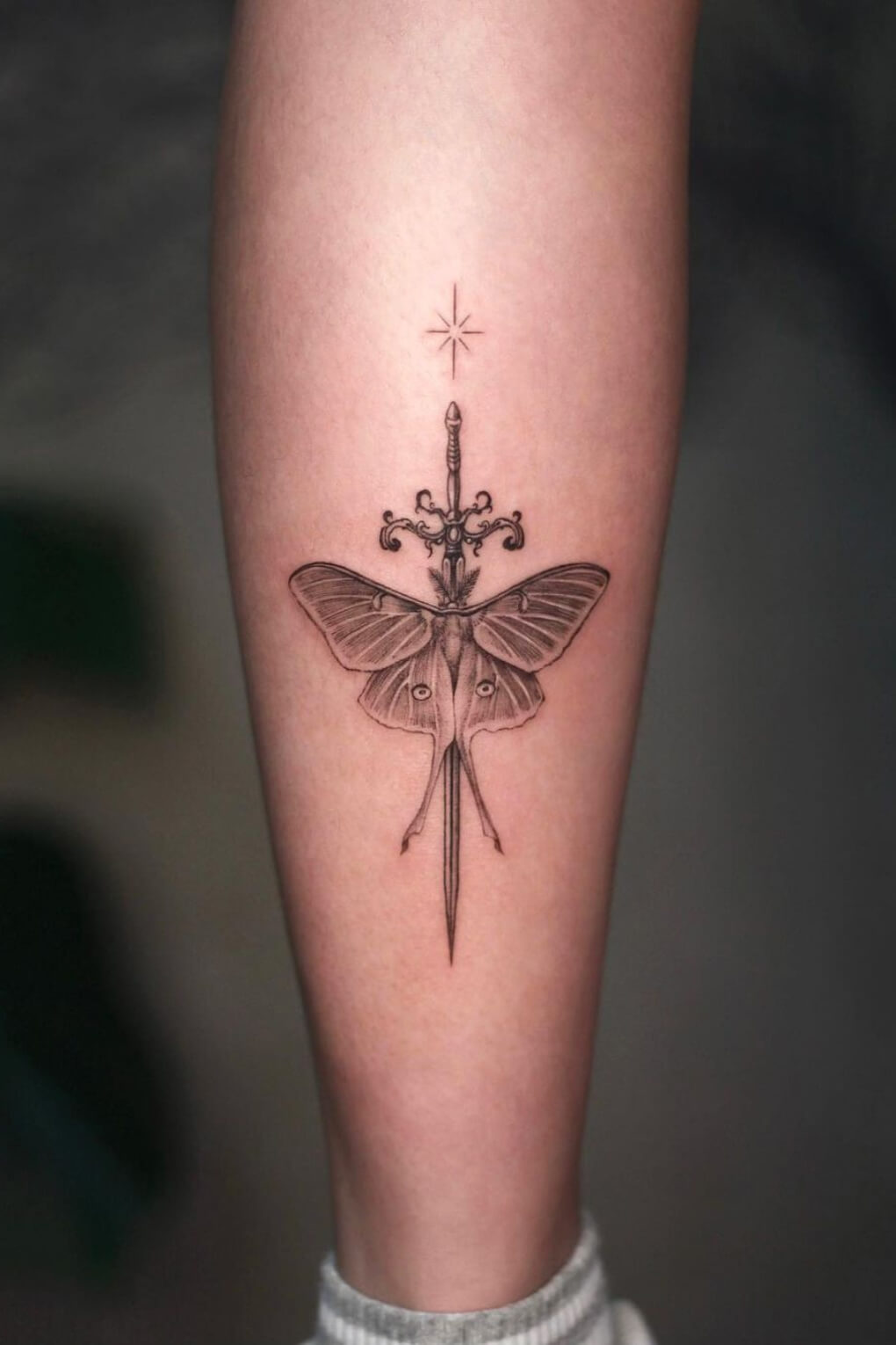 Sword and Moth Tattoo