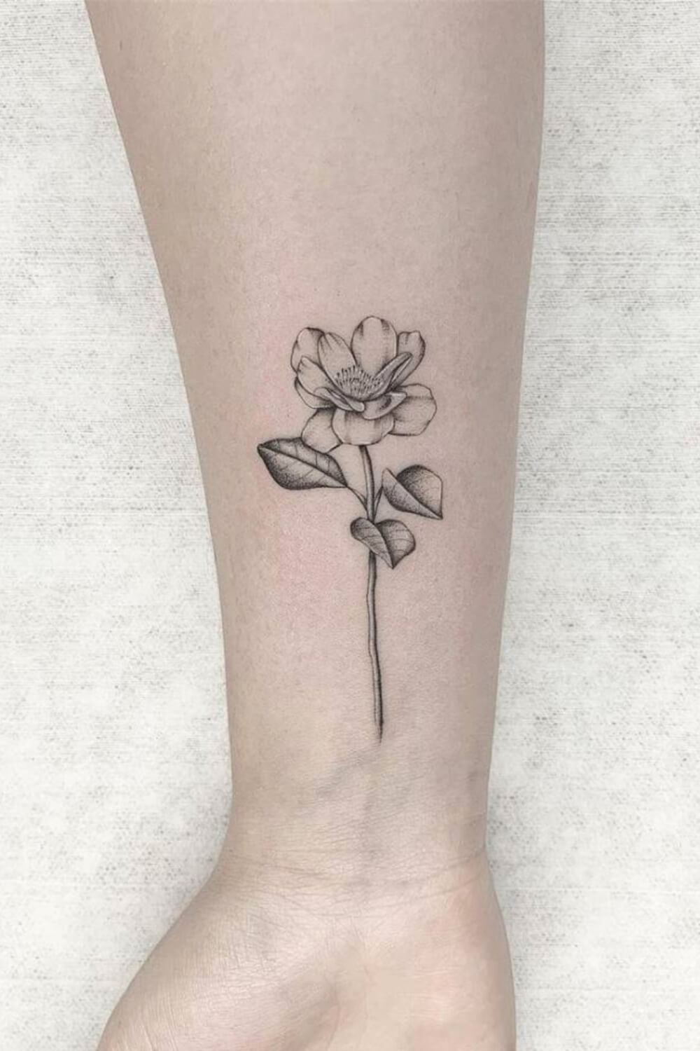 Black and White Magnolia Tattoo