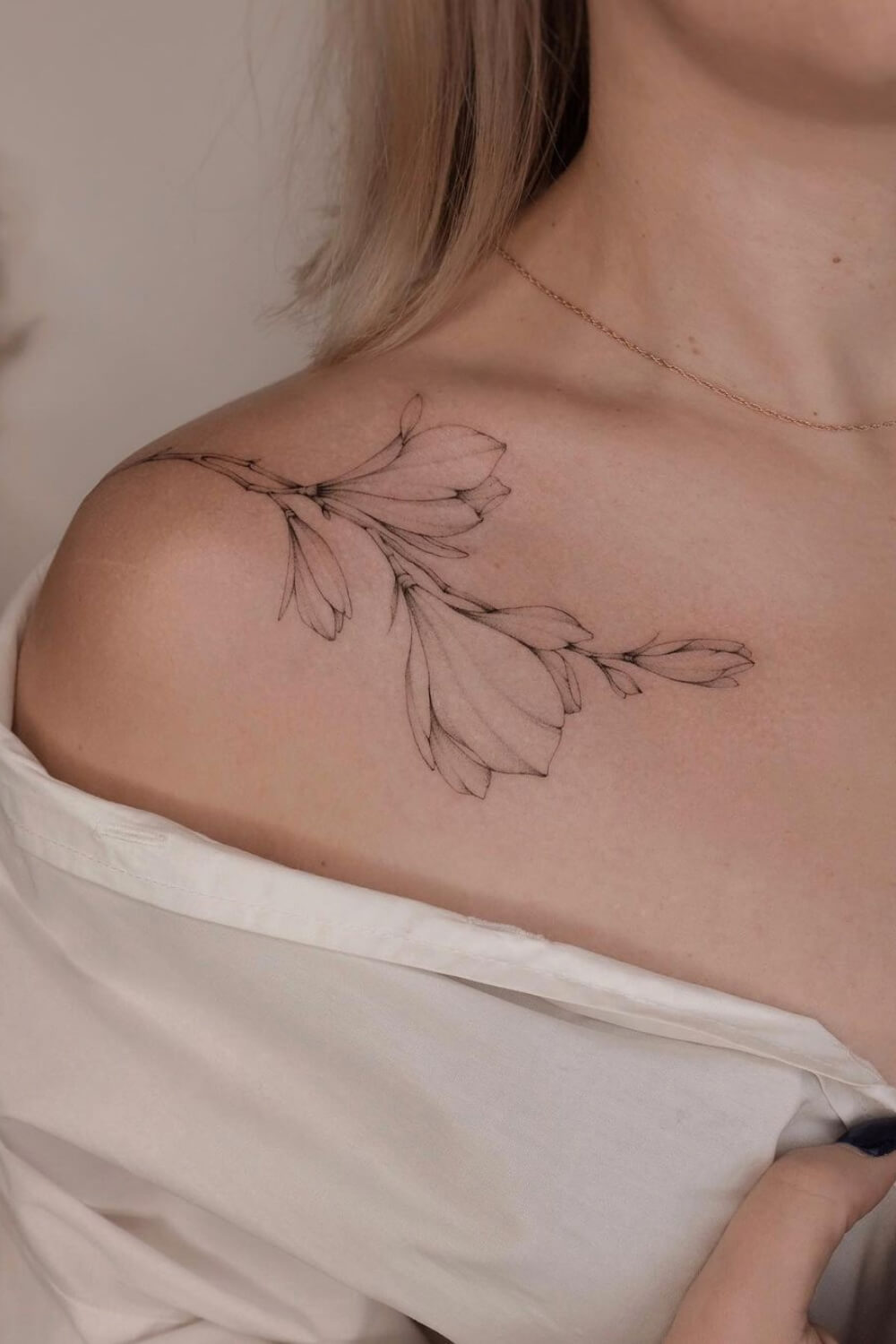 Fine Line Magnolia Tattoo