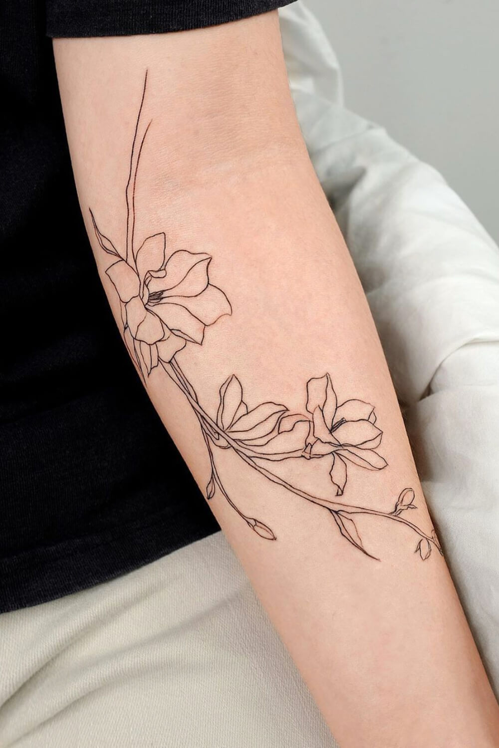 Fine Line Magnolia Tattoo