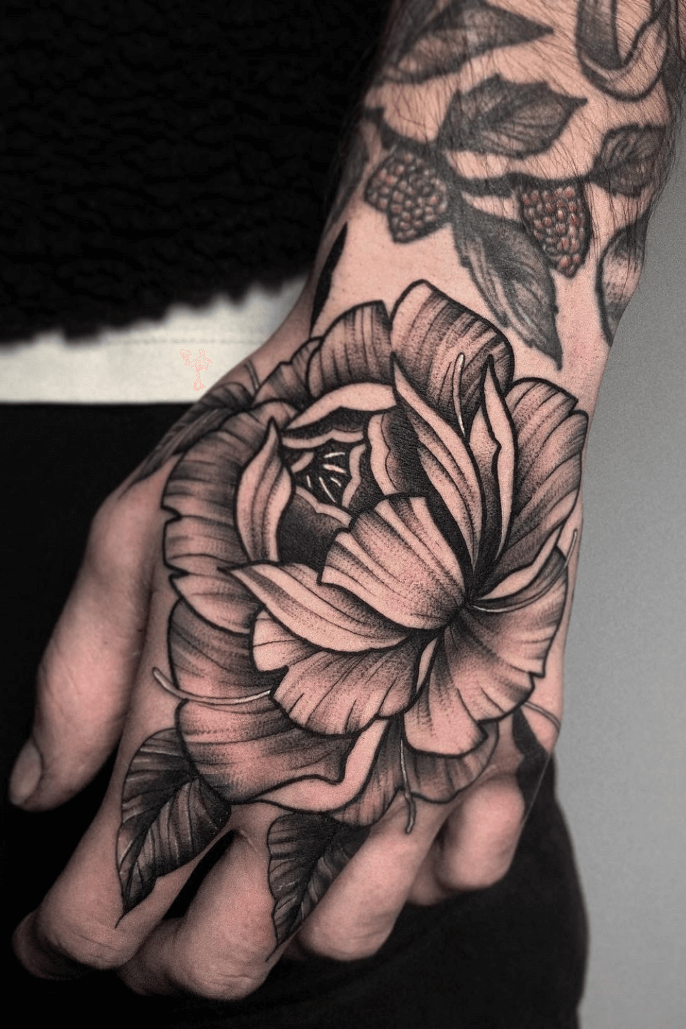 Peony Hand Tattoo